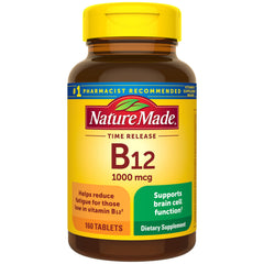 Nature Made B12 1000 mcg tablet close-up shows energy metabolism support for daily vitality.
