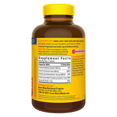 Nature Made Super C bottle label close-up showing ingredients and daily dosage details.