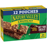 Nature Valley Crunchy Oats 'N Dark Chocolate bars packaging on shelf for pantry snacking