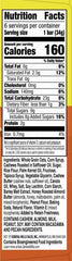 Nature Valley bar closeup highlights crunchy cashews and coating.
