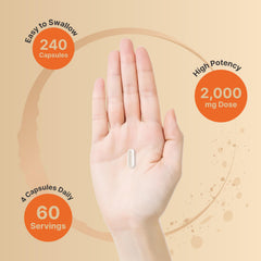 Pouring NatureBell liposomal vitamin C capsules from bottle for daily use.