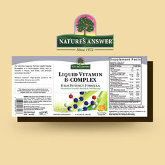 Pouring Nature's Answer Liquid B-Complex shows smooth tangerine flavor for daily use.