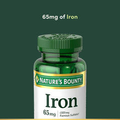 Nature’s Bounty Iron 65 mg tablet on white background for daily use.