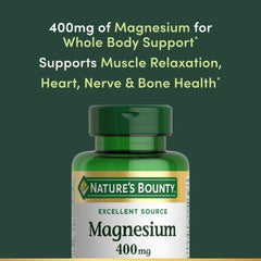 Bottle pouring Nature's Bounty magnesium softgels for daily routine