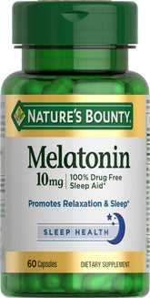 Nature's Bounty Melatonin tablet bottle on nightstand supports restful sleep