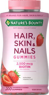 Nature's Bounty Optimal Solutions bottle with strawberry gummies showcasing beauty-from-within benefits