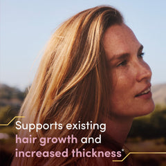 Nature's Bounty Optimal Solutions Hair Growth ingredients close-up highlights biotin and arginine.