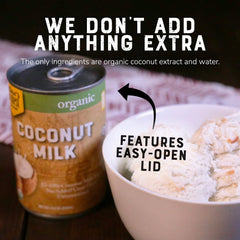 Pouring Nature's Greatest Foods coconut milk into a pan highlights smooth texture ideal for curries