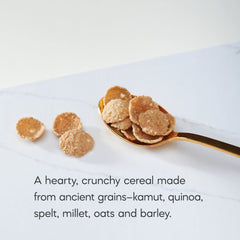 Pouring Heritage Flakes into a bowl with milk emphasizes 23g whole grains per serving.