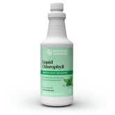 Nature's Sunshine Liquid Chlorophyll bottle poured for a refreshing daily detox ritual.