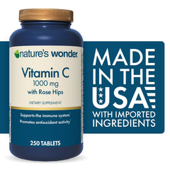 Close-up of Nature's Wonder tablets with rose hips blend for daily wellness