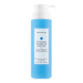 Naturium Energizer Body Wash bottle pouring for a refreshing post-workout cleanse.