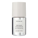 Naturium Multi-Peptide Serum bottle on a clean surface for daily smoothing