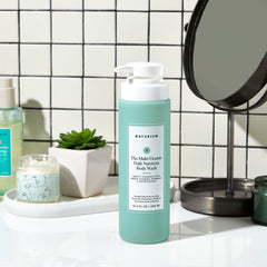 Naturium body wash lather illustrates gentle cleansing for body and face