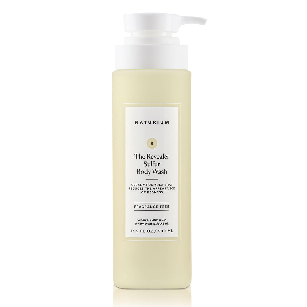 Naturium The Revealer Body Wash bottle being poured for a soothing cleanse.