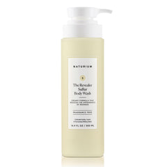 Naturium The Revealer Body Wash bottle being poured for a soothing cleanse.