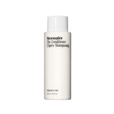 Nécessaire The Conditioner fragrance-free bottle showing neutral hydration for sensitive scalps.