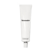 Nécessaire hand cream fragrance-free texture close-up showing smooth hands.