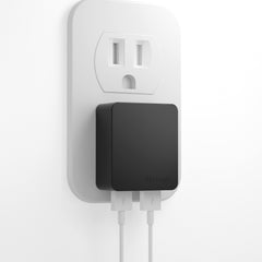 Nekmit dual-port ultra-thin charger shown in slim profile for travel convenience and fast charging.