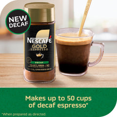 NESCAFÉ Gold Decaf Espresso crema on top in a steaming cup.