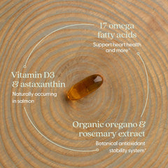 New Chapter Omega-3 Complex softgels close-up shows golden oil texture.