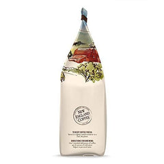 New England Coffee Breakfast Blend Decaf cup with steam promises a smooth start.