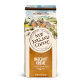 New England Coffee Hazelnut Crème bag front view conveys a breakfast-ready aroma.