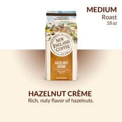 New England Coffee Hazelnut Crème mug with steam highlighting smooth nutty flavor.
