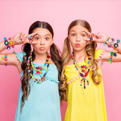 NEXBOX bracelet-making in progress demonstrates hands-on design and fine motor practice.