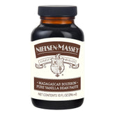 Nielsen-Massey Pure Vanilla Bean Paste bottle with visible specks for richer flavor.