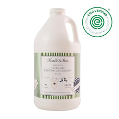 Noodle & Boo detergent cap close-up shows easy dosing for mess-prone babies.