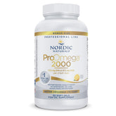 Nordic Naturals ProOmega 2000 lemon bottle on a clean counter, premium omega-3 source.