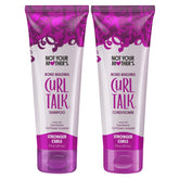 Not Your Mother's Curl Talk Bond Building Shampoo bottle pours for smooth, hydrated curls.