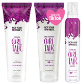Not Your Mother's Curl Talk Kit Defining Cream bottle delivers definition and moisture.