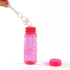 Novelinks kids enjoy bubbles during outdoor play with safe wands.