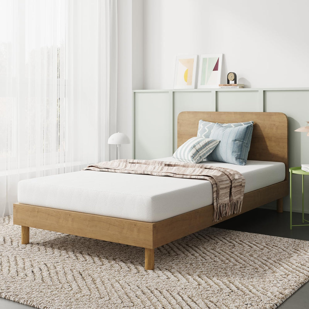 Novilla Twin XL mattress with 8 inch foam layers delivering balanced support.