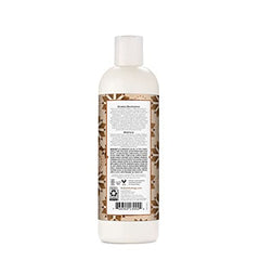 Creamy texture close-up of Nubian Heritage lotion for smooth application