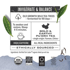 Numi Emperor's Pu-erh tea leaves close-up highlighting earthy malt notes.