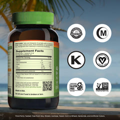 Scoop of spirulina powder beside bottle for daily vegan protein.