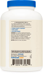 Nutricost Grass Fed Desiccated Beef Liver Capsules beside measuring spoon, convenient 60 servings.