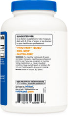 Nutricost bottle being opened to reveal capsules