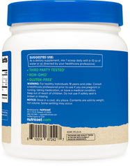 Nutricost turmeric powder shown on kitchen shelf in a glass jar