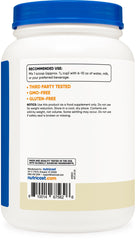 Nutricost vanilla whey protein shake glass showing a creamy shake.
