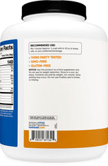 Nutricost Whey Protein Concentrate Chocolate Peanut Butter poured into a shaker.