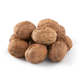NUTS U.S. walnuts in shell ready to crack for fresh snacking.