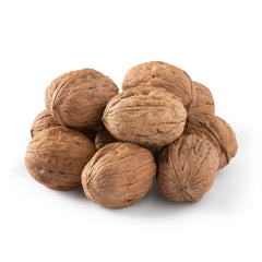 NUTS U.S. walnuts in shell ready to crack for fresh snacking.