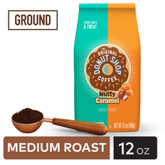 Nutty Caramel ground coffee spoon portion close-up for convenient measurement.