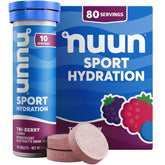 Nuun Tri Berry tablet dissolving in water for easy hydration.