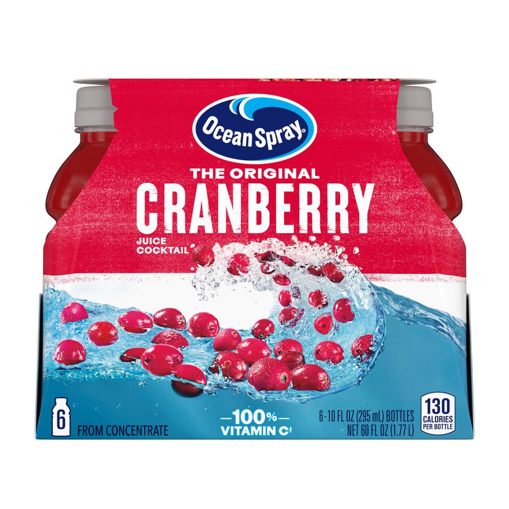 Ocean Spray Cranberry Cocktail Juice Drink bottle pouring into a glass for a refreshing mixer