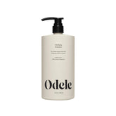 Odele Clarifying Shampoo bottle front view; deep cleanse for buildup-prone hair